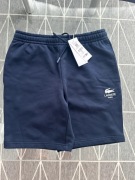 Lacoste - Krótkie spodenki sportowe Blue Marine Rozmiar XS Unisex