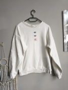 Biała bluza damska crewneck oversize kolorowy nadruk Adidas 