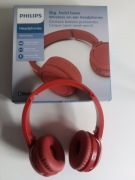 Czerwone bezprzewodowe słuchawki Philips bluetooth