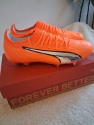 Korki marki Puma Ultra w kolorze pomarańczowym 