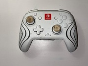 Nintendo Switch pad PDP Afterglow Wave uszkodzony 
