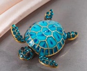 Pięknie wykonana nowa broszka złoty żółw , żółwik wysadzany szafirami 