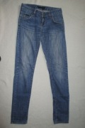 Spodnie jeansowe Calvin Klein niebieskie wytarte - rozmiar W27