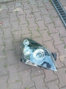 Reflektor przedni ksenon Opel  Astra H prawy Hella