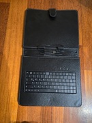 Czarny pokrowiec z klawiaturą, rysikiem i stopką w stanie bardzo dobrym 