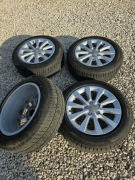 Całe koła opony+felgi 