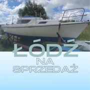 Łódź z ożaglowaniem i silnikiem