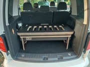 VW Caddy, zabudowa kempingowa łóżko sklejka 
