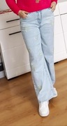 Jeansy r.XL w serca z cyrkoni