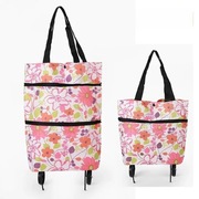 Torba na kółkach 2w1 na zakupy składana kolorowa w kwiaty na ramię