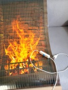 grzejnik na podczerwień - obraz płonący ogień w kominku