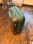 OKAZJA CENOWA American Tourister twarda walizka podróżna 4 kółka turkusowa