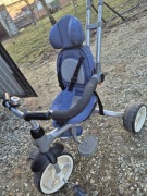 Rowerek dziecięcy trójkołowy niebieski z daszkiem 