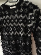 Sweter 122 128 błyszczący czarny srebrny z cekinami 
