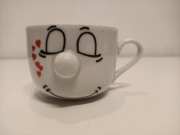 Optymistyczna filiżanka / kubek z wesołą dekoracją 