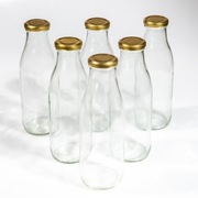 Dwanaście (12) butelek na mleko, wodę, sok itp. o pojemności 750ml. 