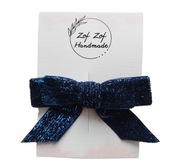 Błyszcząca kokarda na spince