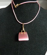 Różowy kwarc "kocie oko" - wisiorek torebka na rzemyku