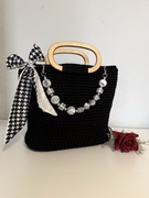 Duża czarna torebka torba do ręki ręcznie robiona na szydełku z kokardą