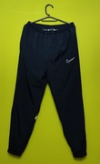 Spodnie dresowe NIKE dry fit academy z kieszeniami na suwak i ściągaczam