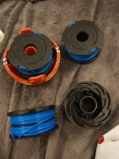 szpule z żyłką i osłony do podkaszarki. 4 sztuki 