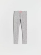 Wzorzyste legginsy z kokardką r 122