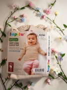 Beżowa bluzeczka niemowlęca z ażurem rozm 62 /68