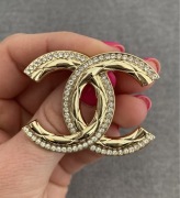 Broszka cyrkonia złota