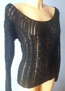 Sweter robiony na drutach