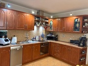 Meble kuchenne z płytą indukcyjną i piekarnikiem