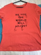 T-shirt pomarańczowy zadbany z napisami z frędzlami 100% bawełna S/M