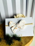 Lniana opaska bezuciskowa dla niemowlaka – motyw roślinny