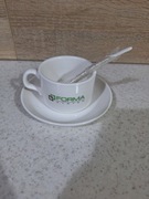 filiżanka ze spodkiem i łyżeczką nowa