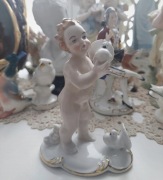 Gerold Tettau figurka chłopiec,  putto  porcelana 