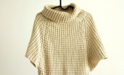 Elegancki sweter oversize ze złotą nitką