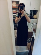 Elegancki Czarny Kombinezon Damski z Peleryną