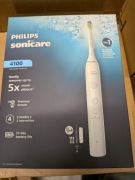 Szczoteczka soniczna Philips Sonicare 4100 biała 4 końcówki etui HX4046/41