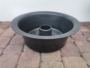 Plastikowa obudowa-pojemnik do przewożenia koła dojazdowego