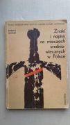 Znaki i napisy na mieczach średniowiecznych w Polsce