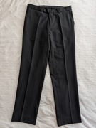 Czarne eleganckie wełniane spodnie wizytowe w kant Stretch 50 ok. M - L