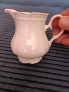 Piękny mlecznik z porcelany