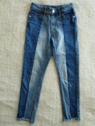 Dwukolorowe strzępione spodnie jeansowe jeansy Lindex 140