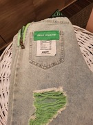 Spodnie dżinsowe  jaskrawymi wstawkami  rozm 40