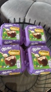 Milka Duże czekoladowe jajko wielkanocne z mini jajeczkami w środku 97g