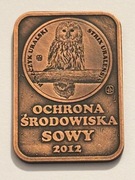 Sowy. Miedziana klipa. Gyges