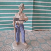 Figurka porcelanowa Chłop z kosą