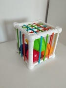 Elastyczna kostka z gumkami montessori 