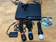 PS3 Slim + kamera + mikrofony SingStar + Move + gry