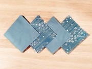 Komplet 4 dwustronnych bawełnianych podkładek pod kubek