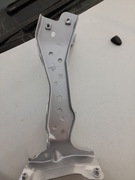 Uchwyt błotnika lewy audi a3 sedan